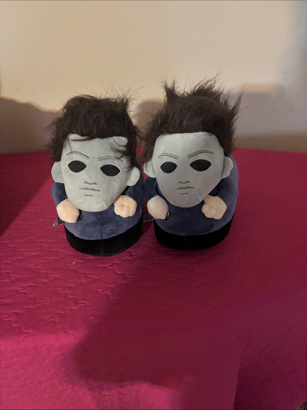 Novelty Plush Slippers Featuring Masked Character Heads in Navy and Gray